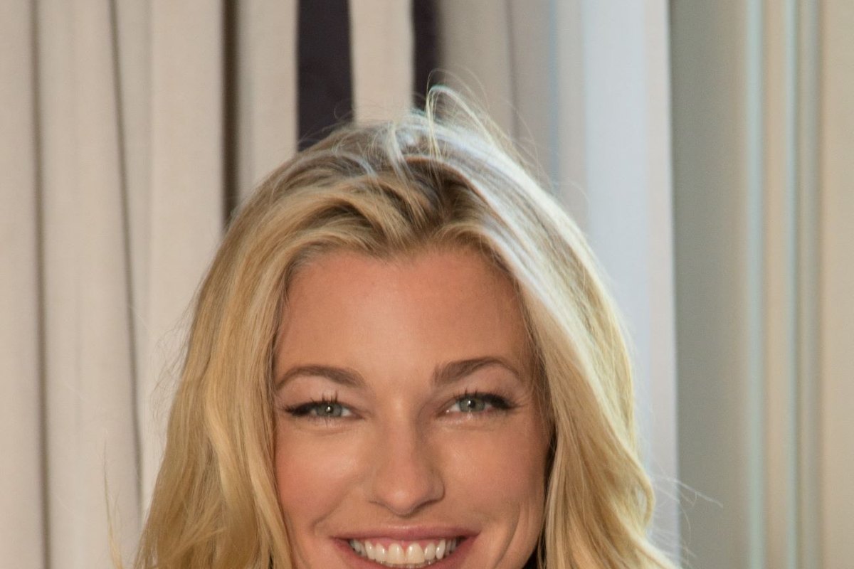 Nicole Junkermann smiling warmly in soft daylight